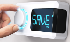 digital thermostat with word "save" on the screen